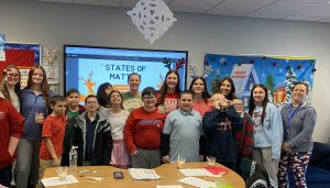 High School PJAS Students Lead Holiday-Themed STEM Activity with Elementary Students
