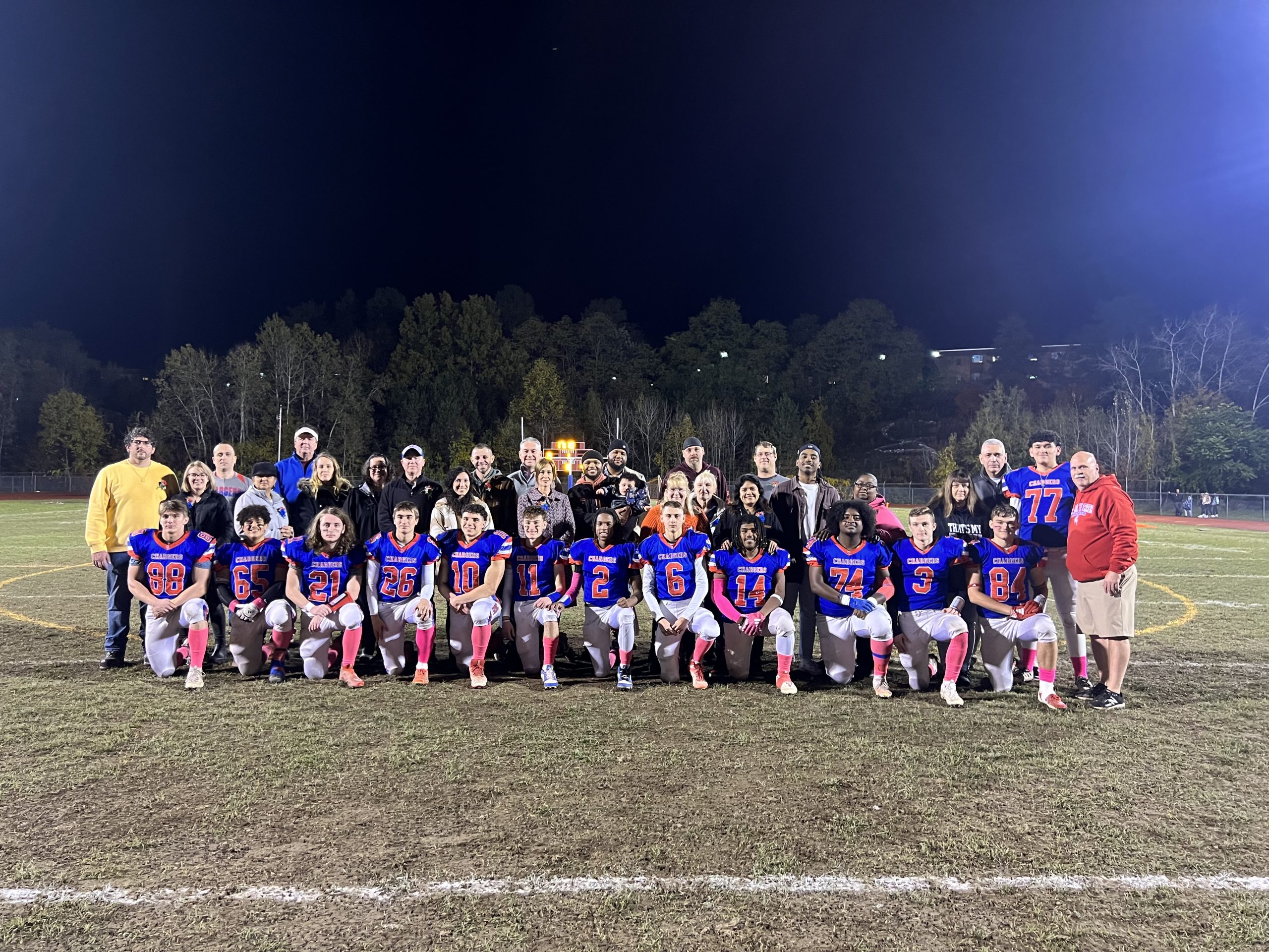 Football Players, Cheerleaders, Marching Band/Drill Team Members, and Cross Country Seniors and Families Honored at Senior-Parent Recognition Night